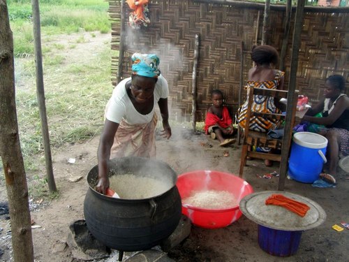 The school’s cook dishing out rice for the country cook